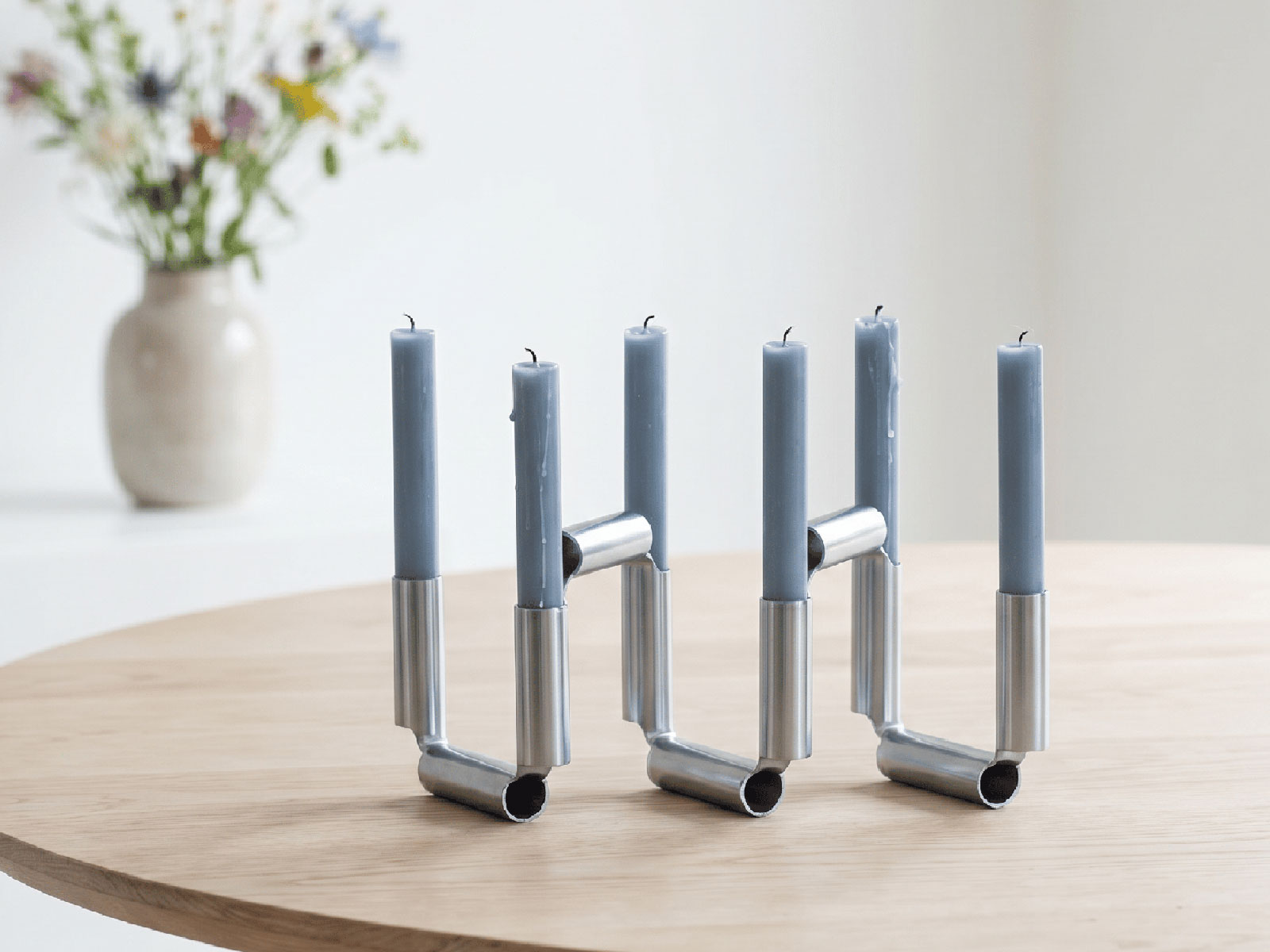 Candle holder — minimal, formed from a single 3D laser cut steel tube